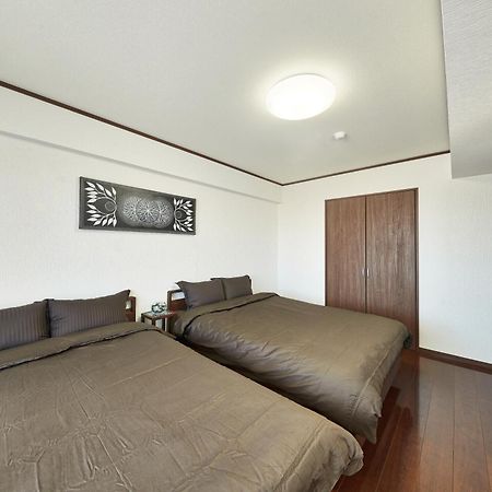 Freedomhillsフリーダムヒルズa棟 Apartment Tomigusuku Luaran gambar