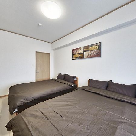 Freedomhillsフリーダムヒルズa棟 Apartment Tomigusuku Luaran gambar