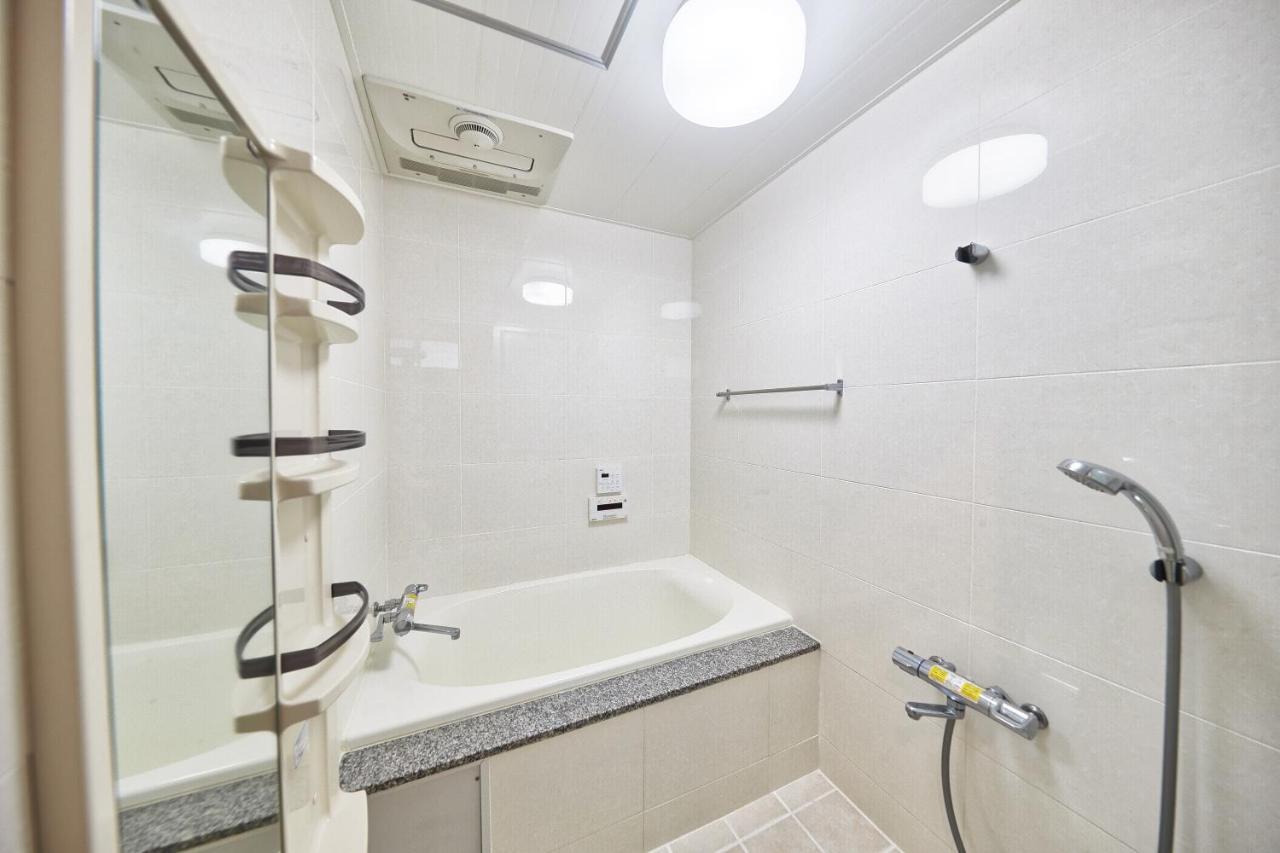 Freedomhillsフリーダムヒルズa棟 Apartment Tomigusuku Luaran gambar